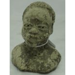 An early 20th Century sculpted clay head of an African woman with necklace
