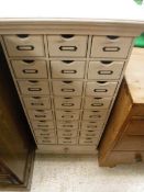 A painted twenty-five drawer chest 100cm tall by 49cm wide CONDITION REPORTS A