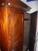 An Edwardian mahogany two door wardrobe raised on a plinth base CONDITION REPORTS