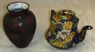 An enamelled Yi Xing teapot with floral and foliate decoration,