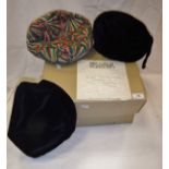 A Belville Sassoon hat box containing three vintage hats,