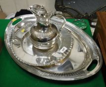 A plated twin handled tray with pierced edge together with a plated bread board tray and water jug