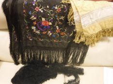 A Victorian brown silk shawl with embroidered floral and insect decoration together with another