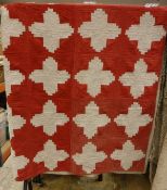 A 19th Century patchwork quilt of red and white cross design CONDITION REPORTS Areas