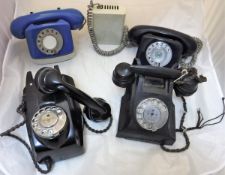 A collection of various early 20th Century black Bakelite GPO telephones,