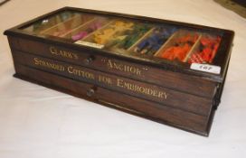 A Clark's "Anchor" wooden embroidery shop display case inscribed "Clark's Anchor Standard Cotton