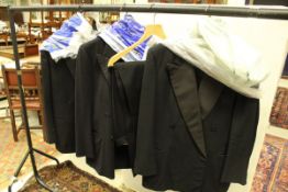 A 1950's black cotton dinner suit comprising jacket bearing label 'Hector Powe, Regent Street,
