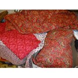 An Early 20th Century Rossendale red Durham style quilt and matching sheet and a further bed throw