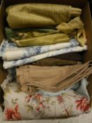Three boxes of assorted fabric remnants