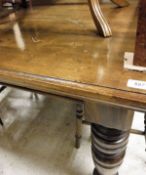 A 19th Century mahogany extending dining table on turned supports to brown china castors,