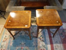 A pair of walnut wine tables with single drawer to X stretchered base raised on squared tapering