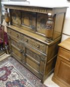 An oak reproduction court cabinet