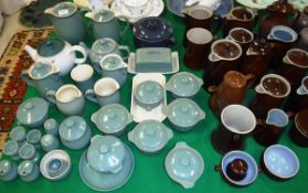 A large collection of Denby china including green tea wares, treacle glazed jugs,