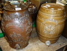 A Victorian relief decorated stoneware barrel with Royal coat of arms,