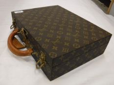 A Louis Vuitton jewellery case with inner liner