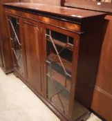 A modern mahogany glazed cabinet in the Victorian manner,