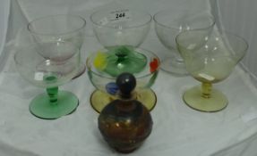 A collection of various glassware to include four hock glasses, various sundae dishes, scent bottle,