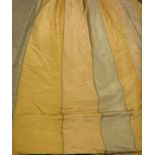 A pair of yellow silk type striped interlined curtains with fixed triple pinch pleat heading,