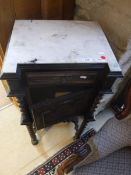 A stained oak pot cupboard with marble top and carved door to barley twist and stretchered legs