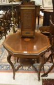 An Edwardian mahogany occasional table raised on cabriole legs and stretched base together with a