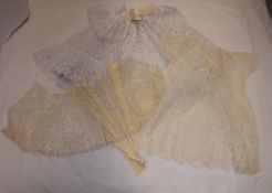 An early 20th Century baby's lace dress, together with a lace cape worn as a child by Col. J. L.