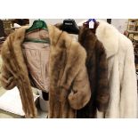 A mink fur stole with tail ends,