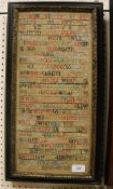 An early 18th Century Georgian sampler depicting an alphabet and verse and animals to the base done