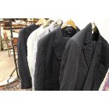 A collection of clothing to include a Versace suit, the trousers size 58,