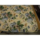 Two pairs of glazed cotton cream ground floral decorated interlined curtains with taped pencil