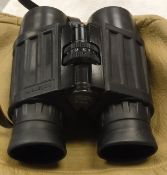 A pair of Carl Zeiss 8 by 32 B binoculars with soft leather case CONDITION REPORTS