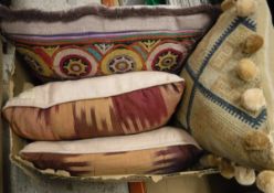 Four various scatter cushions comprising two silk Ikat cushions,