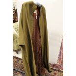 A Worth model olive green corded cotton jacket with brown lining and label inscribed 'Worth Model,