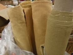 A part roll of gold chenille material,