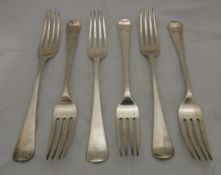 A set of six late George III Old English pattern silver table forks (by William Eley,