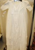 A Victorian cotton and lace children's christening robe together with two other babies gowns and a