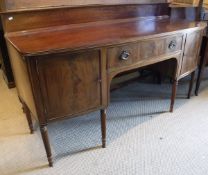 An Edwardian mahogany and cross-banded bow-fronted sideboard