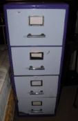 A painted four drawer metal filing cabinet, two Lloyd Loom linen baskets,