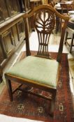 A Harlequin set of eight 18th Century dining chairs with hydra back splats above a drop in seat on