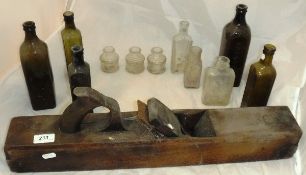 A collection of various old bottles including Dinneford's Magnesia, Bransons Limited Coffee Extract,