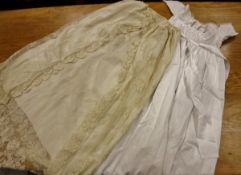 A box containing a large quantity of 19th Century and later christening robes as well as other