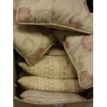 A box of assorted scatter cushions