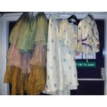 A collection of Victorian and later clothing to include a child's blue and cream day dress,