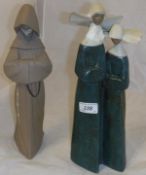A Lladro figure of a monk and a Lladro figure group of two nuns