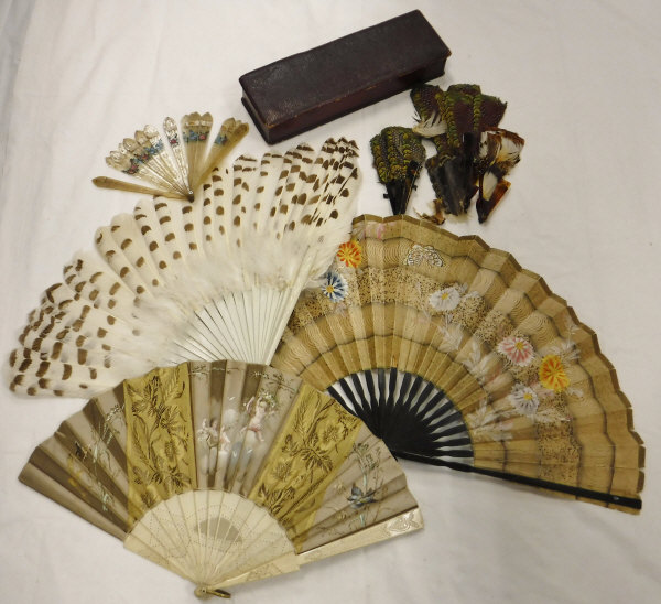 A 19th Century French bone and silk fan with painted panels depicting cherubs,