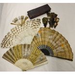 A 19th Century French bone and silk fan with painted panels depicting cherubs,