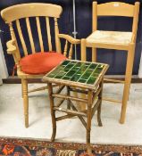 A pair of modern beech kitchen chairs together with a pair of modern beech bar stools,