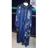 A navy blue Kimono with embroidered dragon and floral motifs