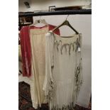 An early 20th century flapper style cream cotton dress with lace collar and arms together with a