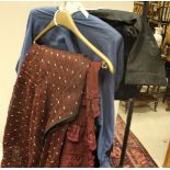 Two Victorian skirts of plum colour plus a blue cotton top with black trim and a Chinese black silk