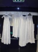 A collection of five 19th Century and later babies christening gowns and other dresses